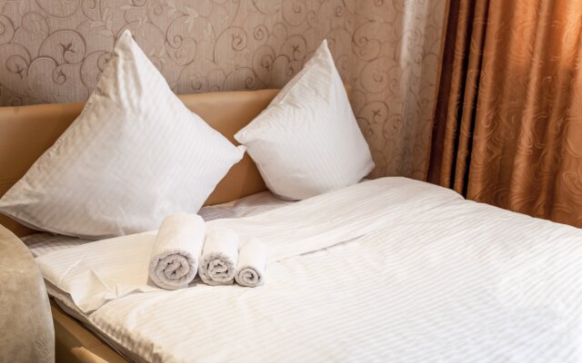 V Tsentre Studiya Voyage Komfort Apartments