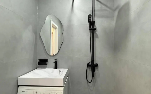 Современная студия в центре Апартаменты