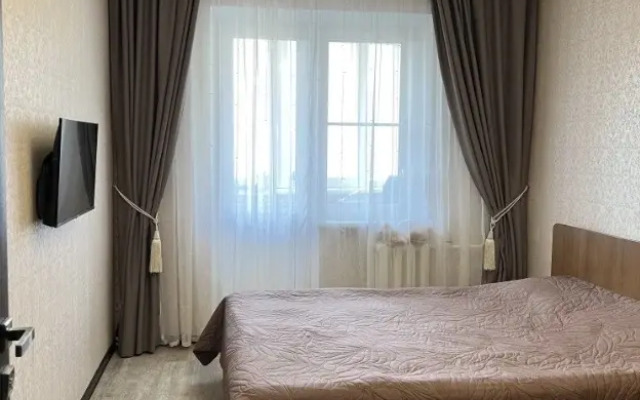 Квартира Просторная уютная трехкомнатная квартира в тихом районе