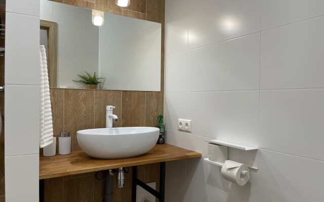 Апартаменты в Окружении Гор и Озера