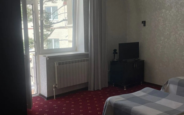 Апартаменты Уютный Номер в Сердце Домбая