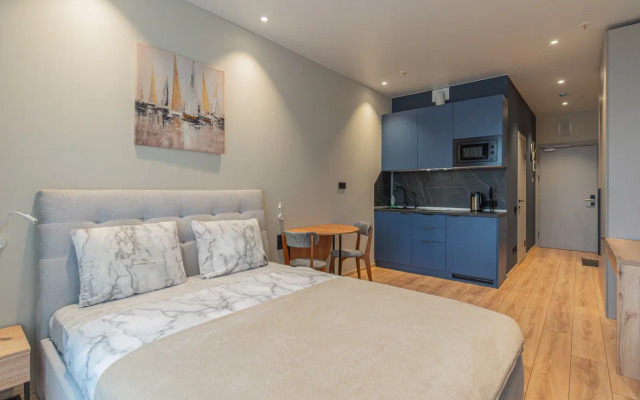 Апартаменты Уютная студия у метро Ладожская