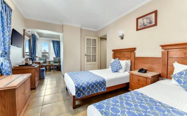 Отель Aura Inn Tiba Pyramids