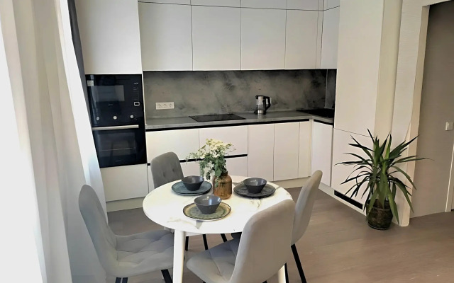 TatAparts oranzhevaya idilliya v sovremennoy studii Apartments