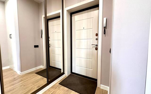 V Novom Dome Flat