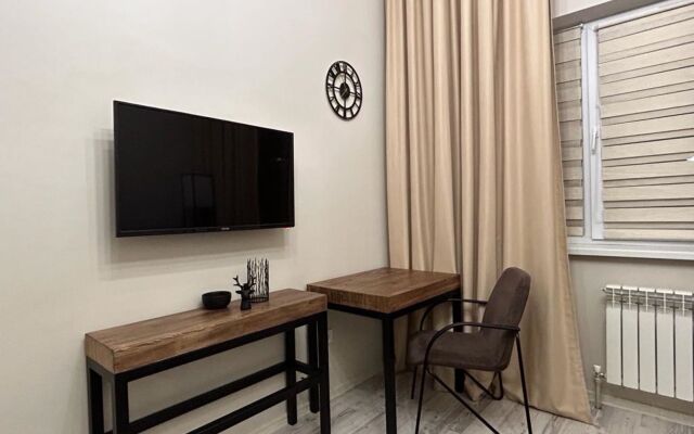 Апартаменты Двухуровневая студия Loft в центре города