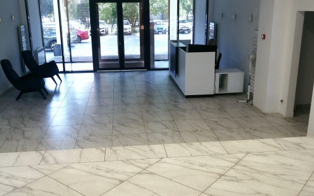 V Tsentre Goroda Apartments
