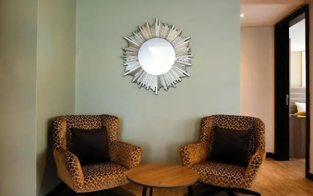 Отель Trademark Suites at Enaki Town