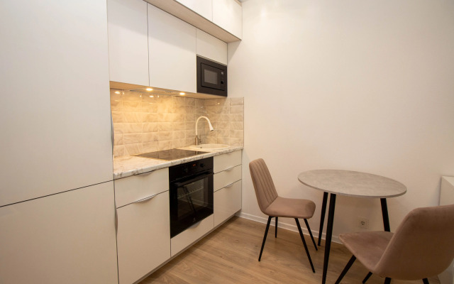 Uyutnaya Studiya V Novom Dome Apartments