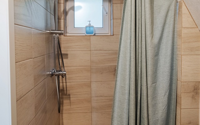 60m2 V Tikhom Lesu Guest House