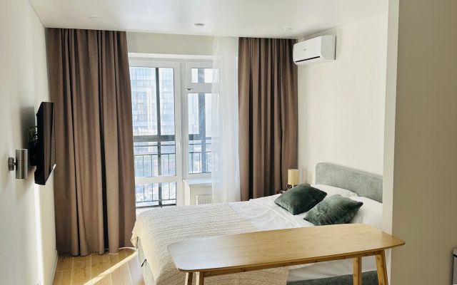 Квартира Красивая студия в современном районе