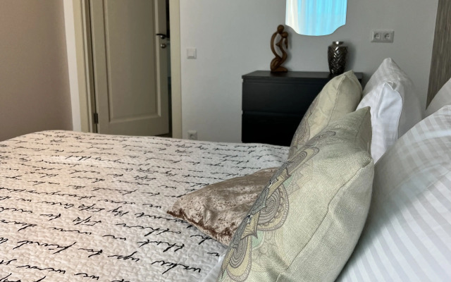 Апартаменты магнолия с зоной патио и отдельной спальней