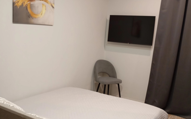 Квартира Уютная студия в рядом с ДРКБ