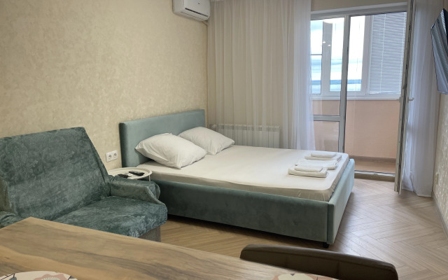 Квартира Уютная студия с видом на Волгу