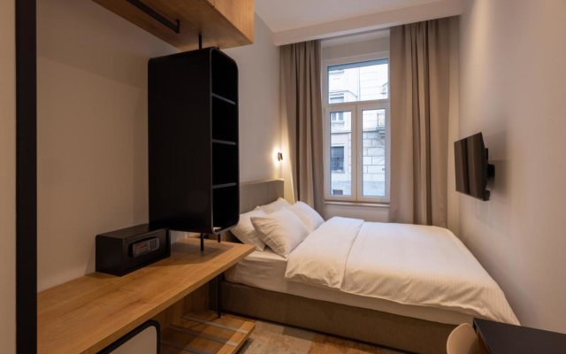 Apartment hotel Hop Inn Rooms & Suites