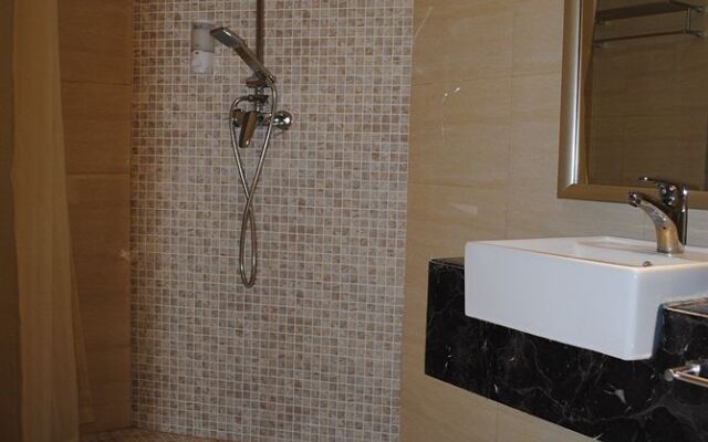 Titan Caoyang Business Hotel