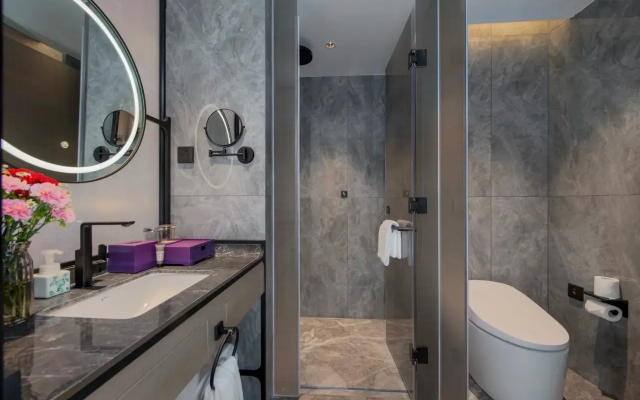 Maison New Century Hotel