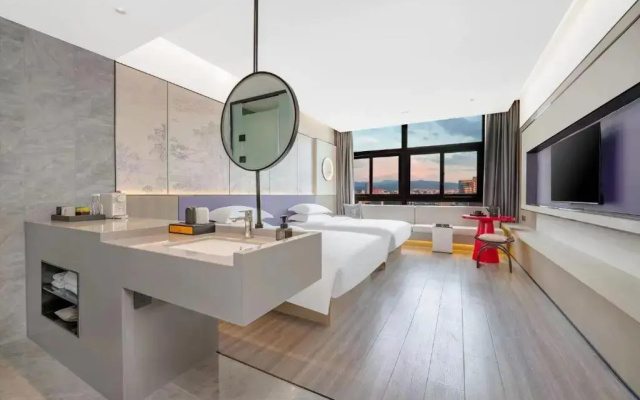 Отель New Century Mansion Cixi Guanhaiwei