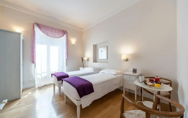 Amaranto Romano Hotel