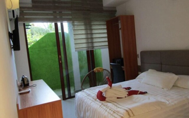 Palm Rest Hotel