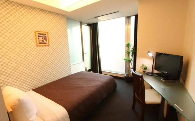 Livemax Budget Korakuen Hotel