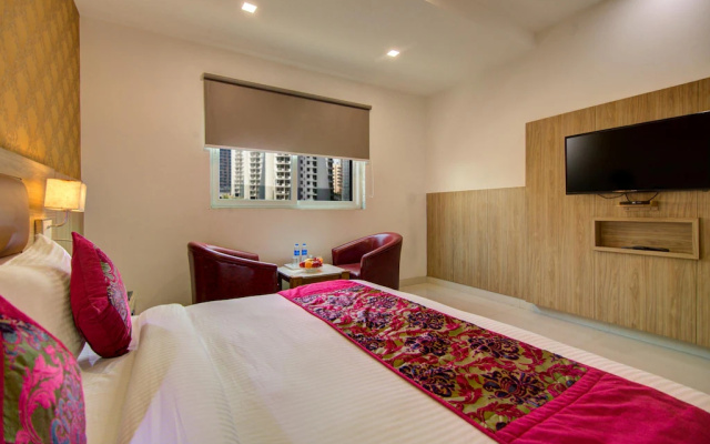 Отель Corporate Suites