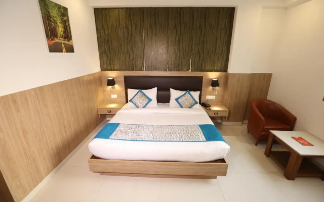 Отель Corporate Suites