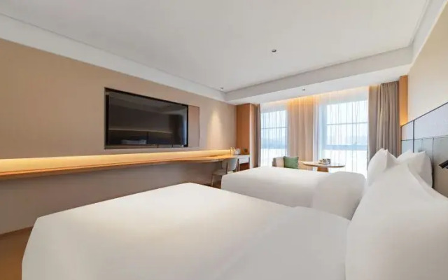 JI Hotel (Zhoushanxinqu Shizhengfu Guangchang)