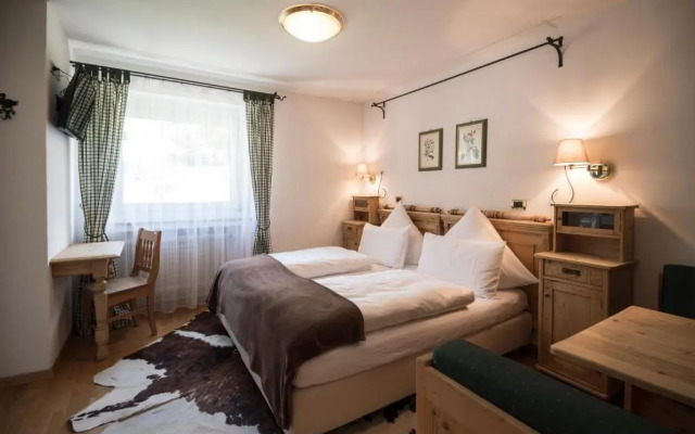 Alpstay — Chalet Hotel Hartmann