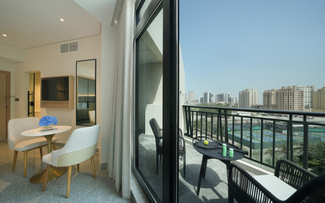 Отель Arabian Park Dubai, an Edge by Rotana Hotel