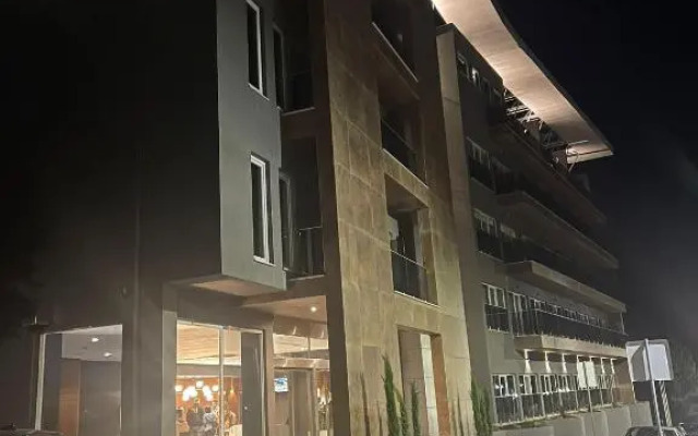 Отель Versatile