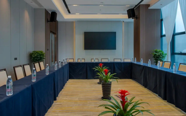 Maison New Century Hotel