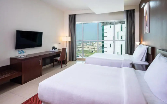 Отель Four Points by Sheraton Sharjah