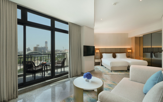 Отель Arabian Park Dubai, an Edge by Rotana Hotel