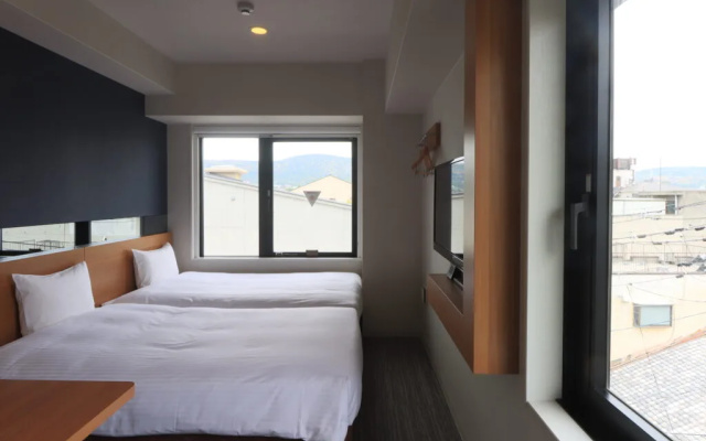 Corner Twin room (트윈 침대 2개) 사진 1
