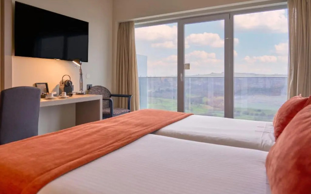 Отель Versatile