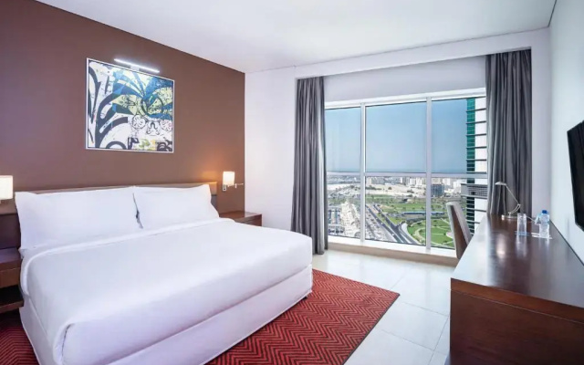 Отель Four Points by Sheraton Sharjah