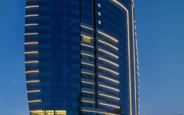 Отель Radisson Blu Hotel, Dubai Canal View