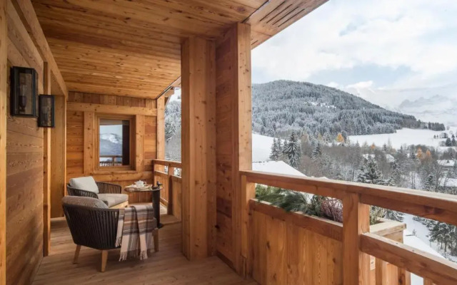 Отель Four Seasons Hotel Megeve