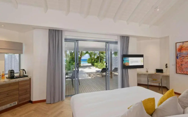 Outrigger Maldives Maafushivaru Resort
