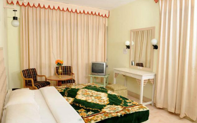 Flagship 75947 Hotel Rainforest Thalayathimund