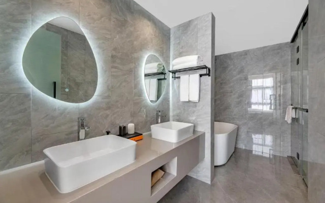 Отель New Century Mansion Cixi Guanhaiwei