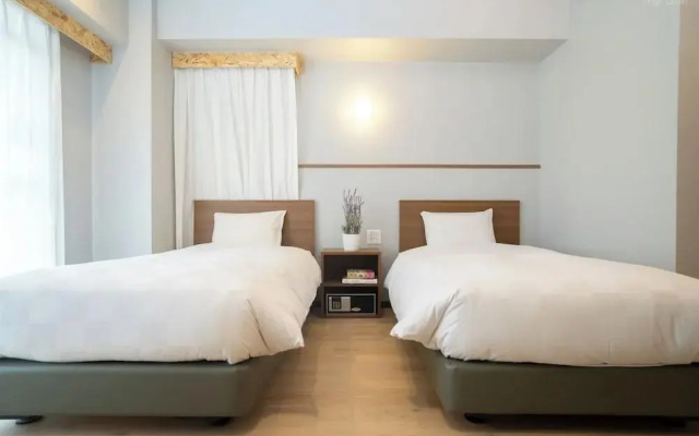 Essential Twin room (트윈 침대 2개) 사진 1