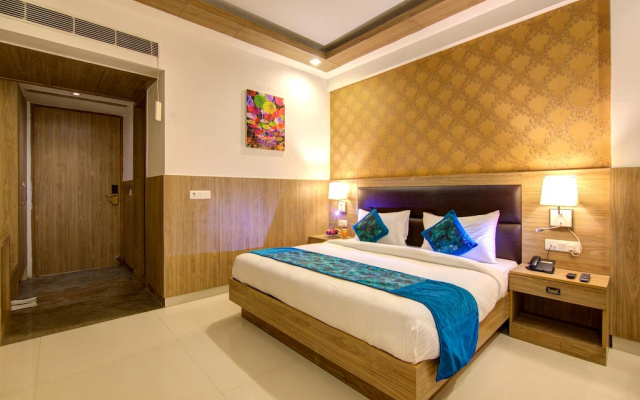 Отель Corporate Suites