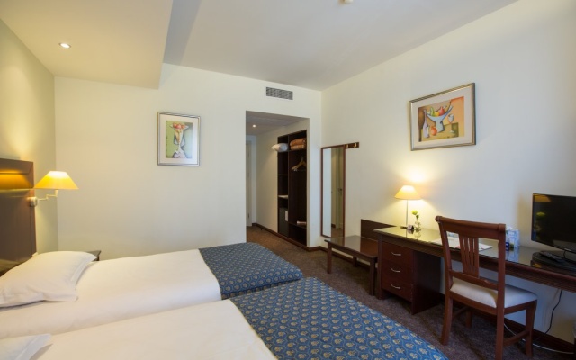 Стандартный двухместный номер с 2 отдельными кроватями — фото 1