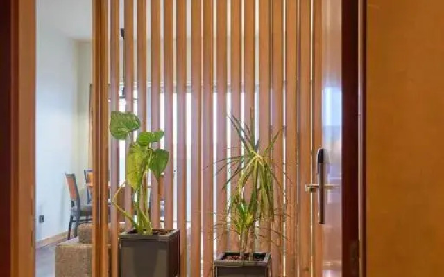 Отель Versatile