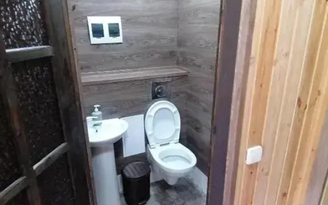 Guest House in Dombay Gostevoj dom v Dombae