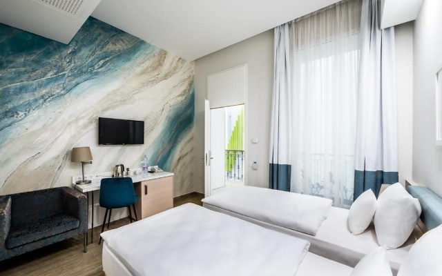 Standard atrium view Double room (full double bed) (no window, bed type is subject to availability)