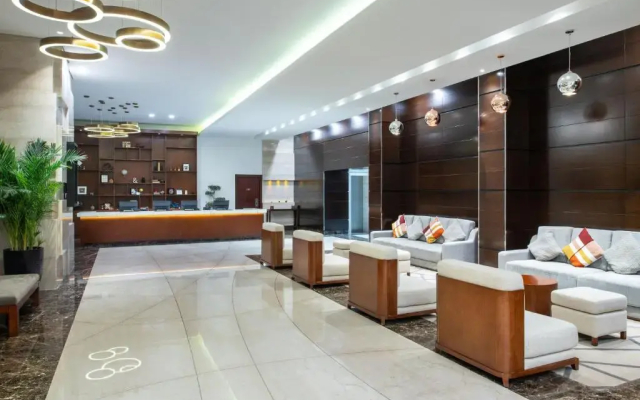Отель Four Points by Sheraton Sharjah