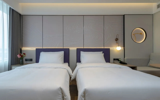 Maison New Century Hotel